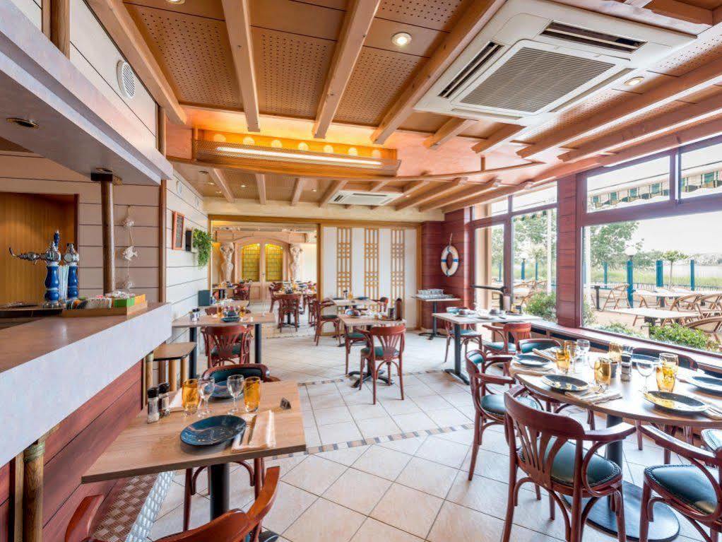 Logis Hotels - Au Poisson D'Argent - Hotel 3 Etoiles Et Restaurant Le Mesnil-en-Vallee Exterior photo